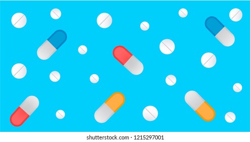 Pills and tablet blue background.