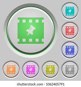 Pin movie color icons on sunk push buttons