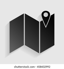 Pin on the map. Black paper with shadow on gray background.