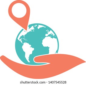 A pin positioned on a globe in one hand to show a location