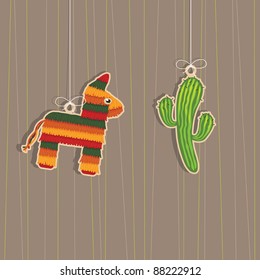 pinata and cactus hanging mexican decorations with copy space