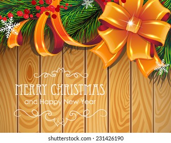  Pine branches, bow, ribbons and red berries on wooden board.