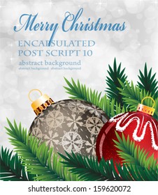 Pine branches with Christmas ornaments on a  sparkling background 