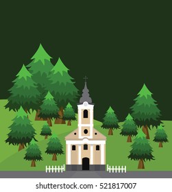 Pine forest on the hill with a church