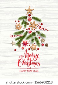Pine tree branches, gingerbreads and stars