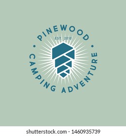 Pine wood logo. Camping or resort. Pine cone in a circle with letters and rays. Adventure team emblem.