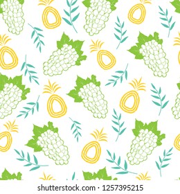 Pineapple and grapes seamless background pattern