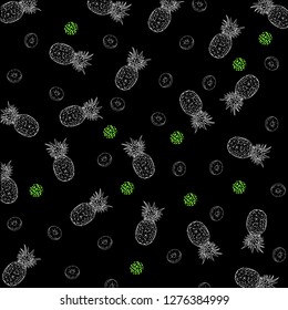 Pineapple on a black background with green leaves