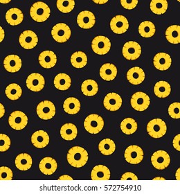 Pineapple slices seamless pattern on black background.