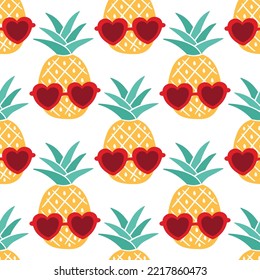 Pineapples with heart sunglasses seamless pattern
