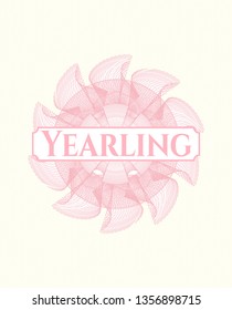 Pink abstract rosette with text Yearling inside