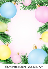 Pink background with Christmas balls of different colors and branches of a Christmas tree. The concept of a holiday and a new year.