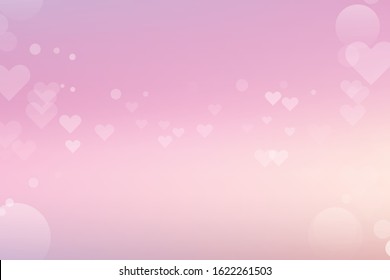 Pink background with heart bokeh for valentine's day.