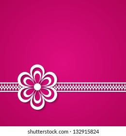 pink background with a lace and a flower