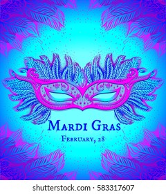 Pink background on the blue background. Carnival mask with blue and lilac feathers.