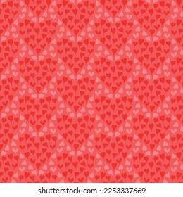 rosafarbener Hintergrund mit roter Herzstruktur. Dekoratives, nahtloses Muster für Verpackungspapier, Tapeten, Textilien, Grußkarten und Einladungen. St. Valentins Tageshintergrund.