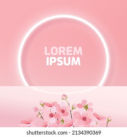 The pink background, the stage in front of the neon sign, and the cherry blossoms