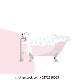 Baño rosa con burbujas en el agua

