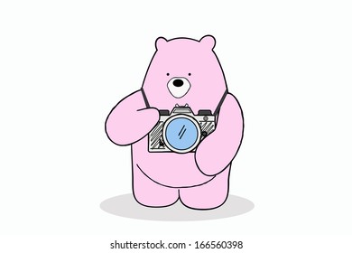 Pink bear with a camera