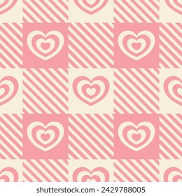 Pink and beige hearts on gingham background. Vector seamless pattern in soft retro pastel colors.