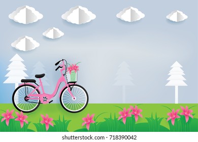 The pink bicycle parked in a flowers-filled outdoor garden. There is a sky and white clouds behind.vector illustration paper art style