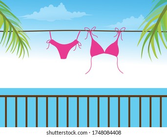 Pink bikini hanging outdoor in sunshine sky Summer concept background