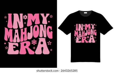 Design de camiseta rosa e preta com o texto In My Mahjong Era em um estilo retrô com estrelas e flores.