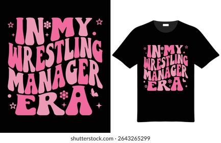 Pink and black t-shirt design featuring retro-style typography that reads In My Wrestling Manager Era. Includes small floral and butterfly accents.
