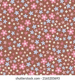 Pink and blue small flowers seamless pattern on a brown background. Hand drawn fabric gift wrap wall art design. Vector illustration.