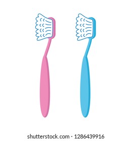 Pink and blue toothbrush isolated