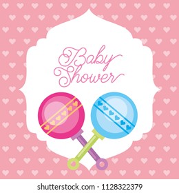 pink and blue toy rattles hearts background baby shower card