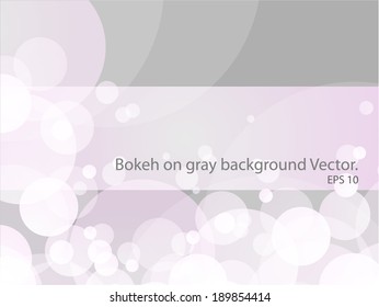 Pink Bokeh on gray background.