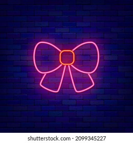 Pink bow neon icon. Present concept. Outer glowing effect banner. Holiday design on brick wall. Luminous label. Editable stroke. Vector stock illustration