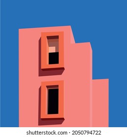 edificio rosa con fondo azul