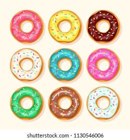 Pink, Chocolate, Lemon And Blue Mint Donut With Different Topping On White Background