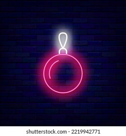 Pink Christmas ball neon icon. Fir tree decoration. Happy new year sign. Season winter holiday. Shiny signboard on brick wall. Editable stroke. Vector stock illustration