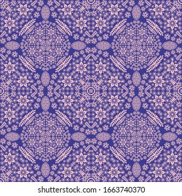Pink color mandala seamless pattern for wallpaper, wrapping, textile, bags and bedsheet. Contemporary motif endless fabric on blue background for tile. Modern ethnic geometric repeat texture.