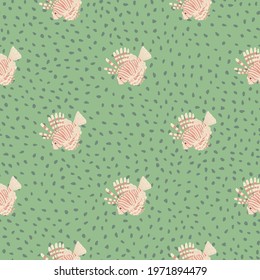 Pink colored lionfish silhouettes seamless pattern in nature theme. Green dotted background. Abstract style. Perfect for fabric design, textile print, wrapping, cover. Vector illustration.