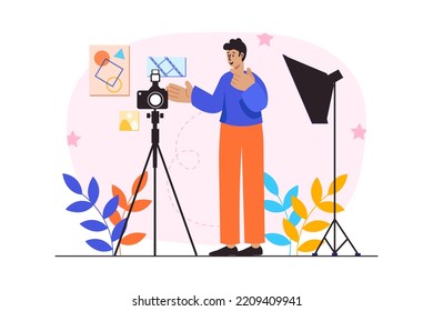 Pink concept Photo studio with people scene in the flat cartoon design. Photographer sets up all the cameras before the model arrives. Vector illustration.
