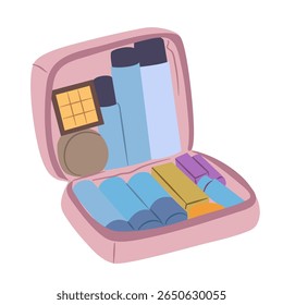 Pink cosmetic bag open with makeup, tubes and other essentials inside, perfect for packing travel necessities or organizing beauty supplies.