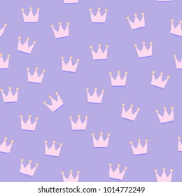 Pink crowns on purple background seamless pattern