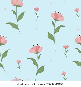 Pink delicate flowers on a blue background. Seamless summer pattern.
