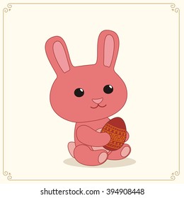 Pink easter bunny sitting with chocolate egg in hand.