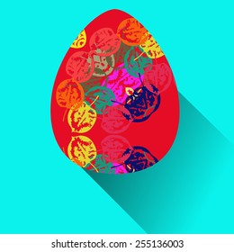 Pink Easter egg with floral ornaments on an azure  background. Hand drawn. 