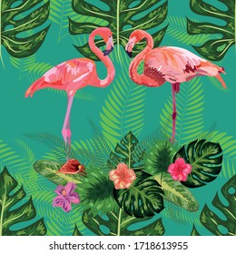 Pink exotic flamingo wading birds couple. Seamless pattern texture. green tropical jungle rainforest palm tree leaves.