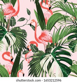 Pink flamingo and exotic palm leaves, pink background. Floral seamless pattern. Tropical illustration. Exotic plants, birds. Summer beach design. Paradise nature.