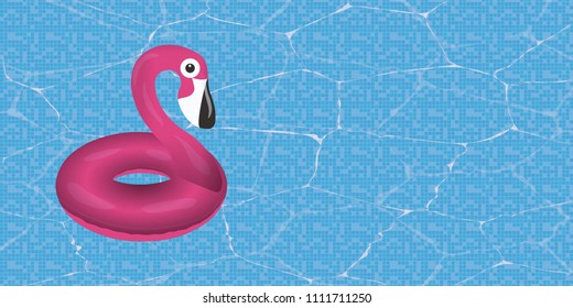 Pink flamingo float in a pool in summer.