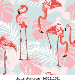 Pink flamingo, graphic palm leaves, blue background. Floral seamless pattern. Tropical illustration. Exotic plants, birds. Summer beach design. Paradise nature.