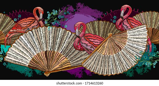 Pink flamingo, meadow green flowers and colorful japan fan. Embroidery. Asian horizontal seamless pattern.  Fashion oriental art. Japanese and Chinese decorative style. Template for clothes, textile 