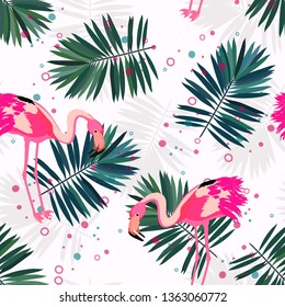 Pink flamingo with tropical leaves floral seamless pattern. Palm tree leaves with exotic birds. Flamingo floral background textile design.